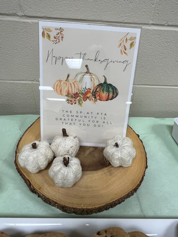 Photo of the sign that had leaves and pumpkins on it.  Text on sign: Happy Thanksgiving!  The SP-AT PTA community is grateful for all you do! 